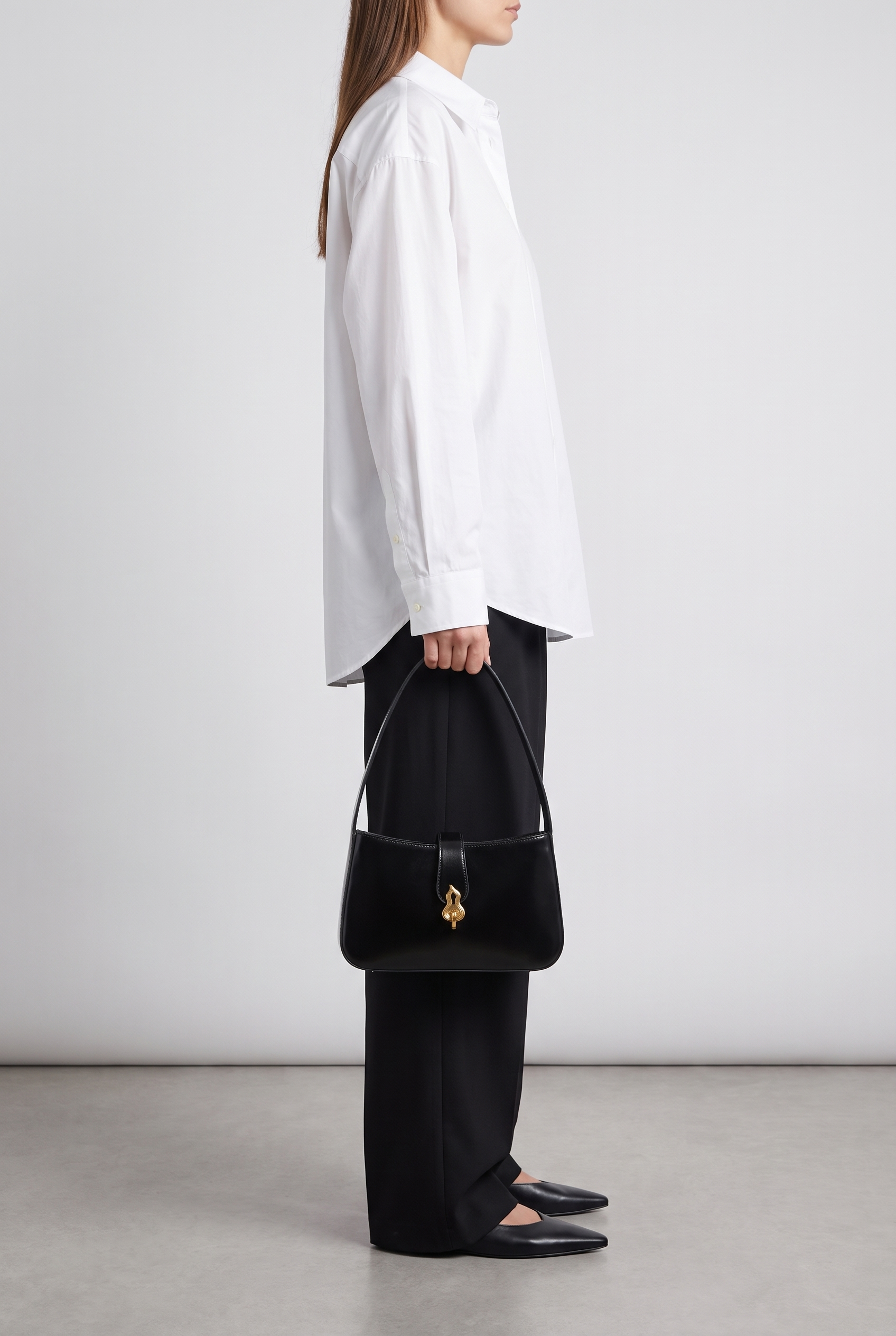 Sac FLAME noir, porté à la main
