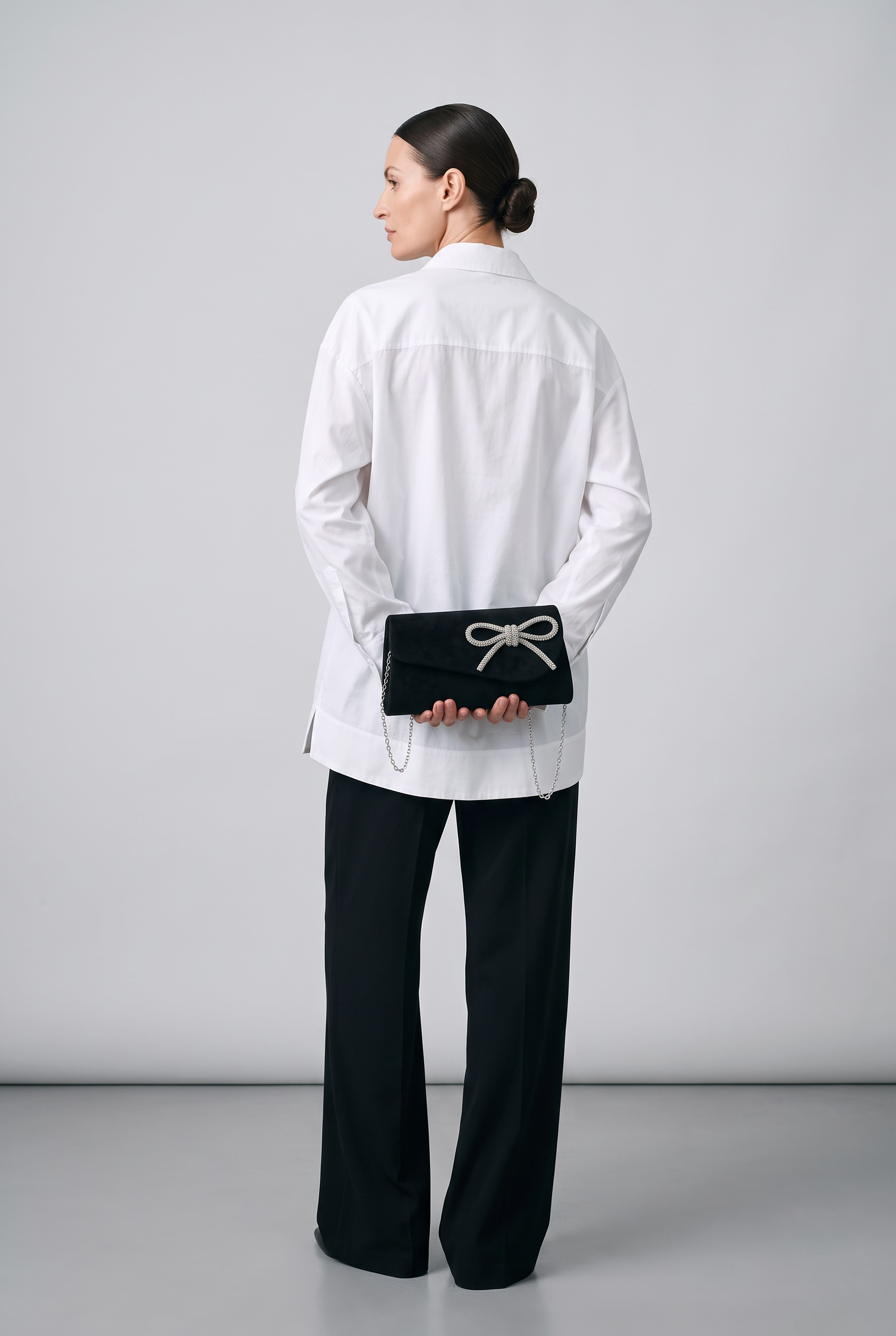 Pochette GALA noir, porté, de dos